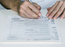 man filling form