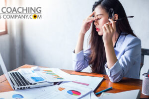 Stressed Person at Desk Multitasking