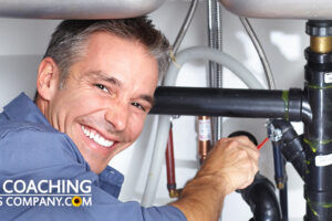 Plumber Fixing Sink