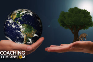 Two Hands With Earth and Tree for Voluntary Simplicity