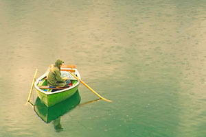 Client shown by fisherman in boat