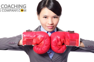 Motivated Leader wearing red boxing gloves