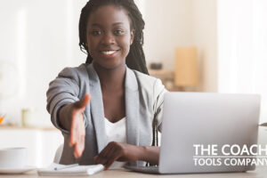 Confident, Successful Client at Desk with Laptop