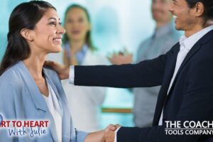 Happy boss greeting new female manager