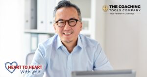 Man at a desk reflecting on role models.